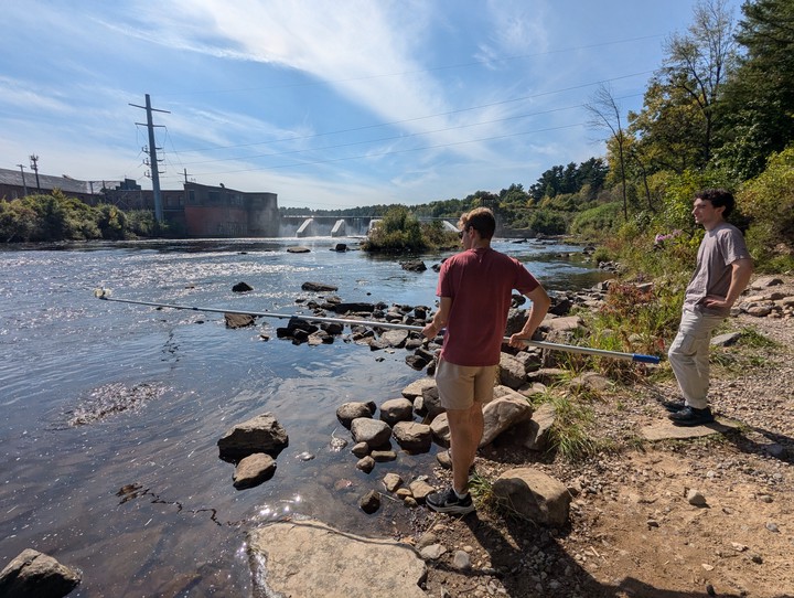 Photo of students collecting water samples